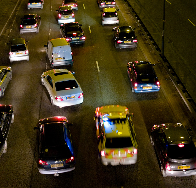 North Circular road, London police car in traffic. Taken from the canal bridge overhead, near Han...